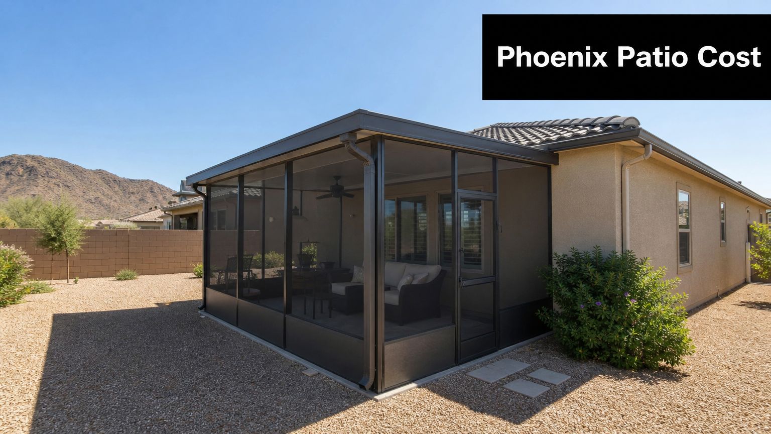 A modern screen patio enclosure attached to a house in a desert landscape in Phoenix, Arizona.
